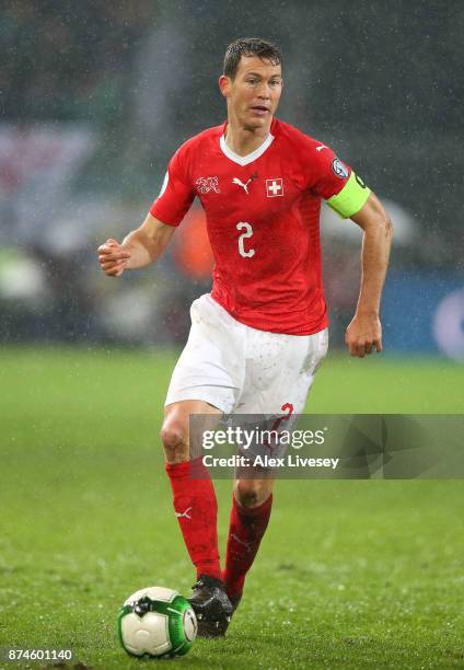 Stephan Lichtsteiner of Switzerland controls the ball during the FIFA 2018 World Cup Qualifier Play-Off second leg match between Switzerland and...