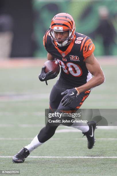 Josh Malone of the Cincinnati Bengals runs the football upfield during the game against the Indianapolis Colts at Paul Brown Stadium on October 29,...