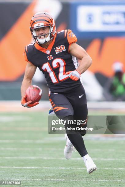 Alex Erickson of the Cincinnati Bengals runs the football upfield during the game against the Indianapolis Colts at Paul Brown Stadium on October 29,...