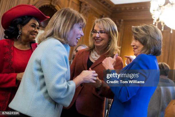 From left, Reps. Frederica Wilson, D-Fla., Jackie Speier, D-Calif., former Rep. Gabrielle Giffords, D-Ariz., and House Minority Leader Nancy Pelosi,...