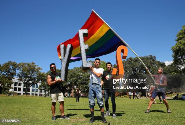 People celebrate the result announcement on November 15, 2017 in Sydney, Australia. Australians have voted for marriage laws to be changed to allow...