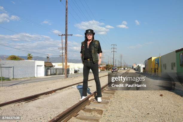 Year old Lemmy Kilmister lead singer of English rock group Motorhead stands on the railway tracks on March 12, 2001 in North Hollywood, Los Angeles,...