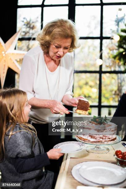 grandma always have biggest piece of cake for me - biggest cake stock pictures, royalty-free photos & images