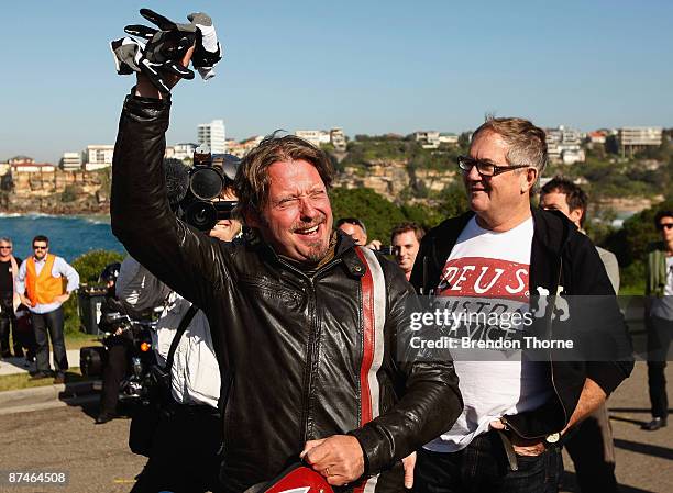 Adventurer Charley Boorman and Deus Ex Machina motorbike store founder Dare Jennings are greeted by fellow motorbike enthusiasts during his next...