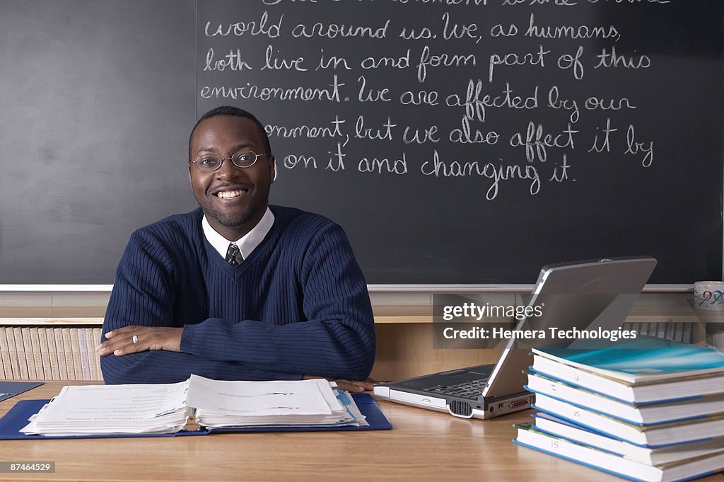 Teacher at desk