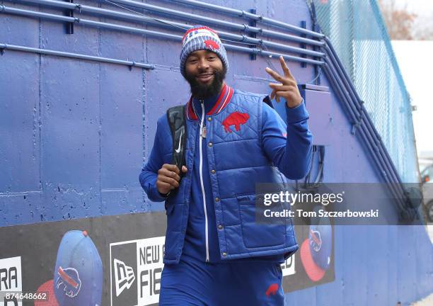 Joe Webb of the Buffalo Bills gives a sign as he arrives at the stadium before the start of NFL game action against the New Orleans Saints at New Era...