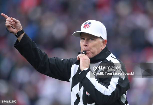Referee Terry McAulay blows his whistle after making a call during the Buffalo Bills NFL game against the New Orleans Saints at New Era Field on...