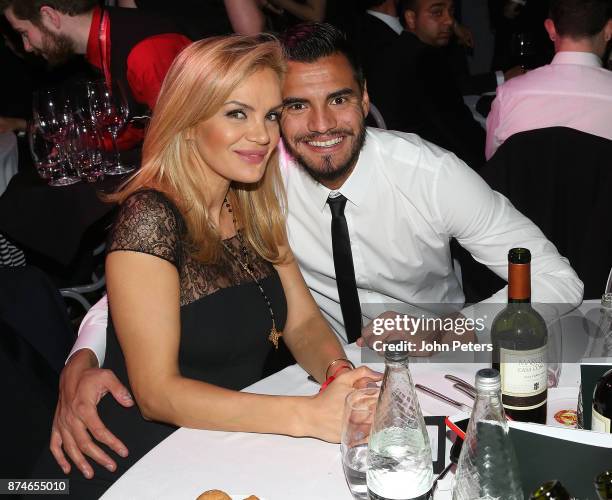 Sergio Romero of Manchester United poses with his partner Eliana Guercio at the annual United for UNICEF gala dinner at Old Trafford on November 15,...