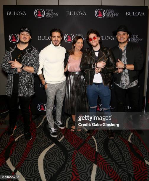 Yuri Ayala, Bulova brand representative with Piso 21 attend the gift lounge during the 18th annual Latin Grammy Awards at MGM Grand Garden Arena on...