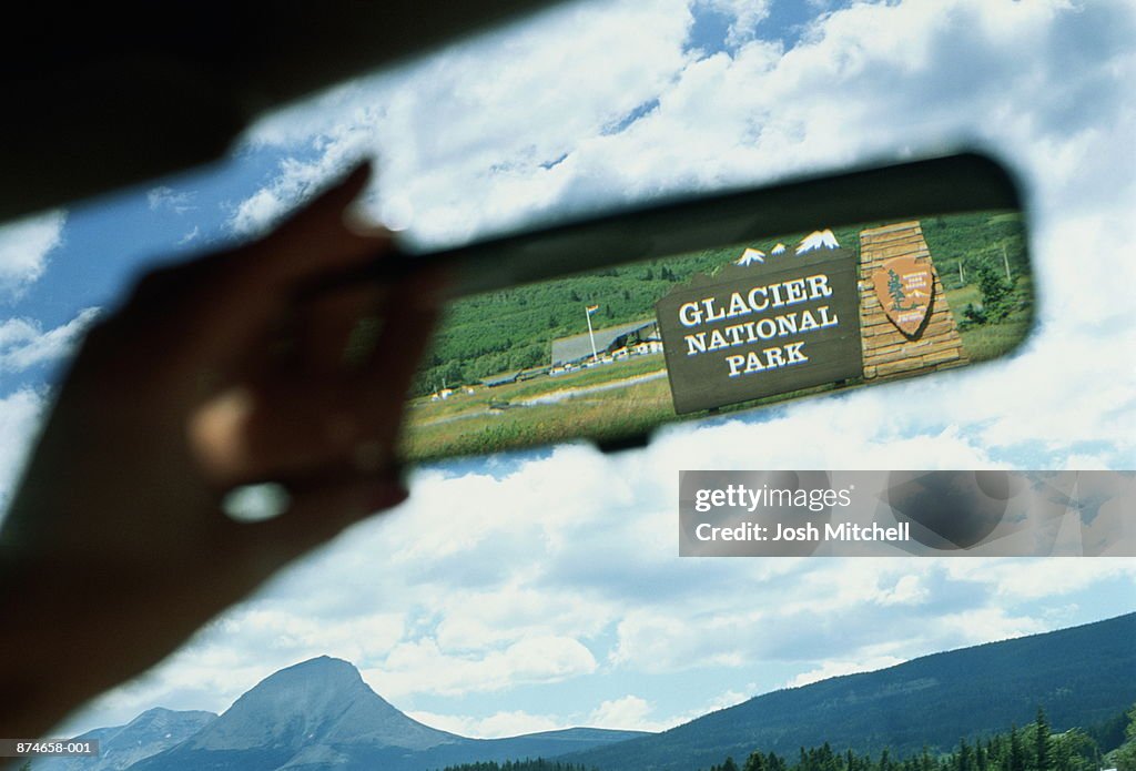 USA, Montana, Glacier Nat. Park, sign reflected in rear-view mirror