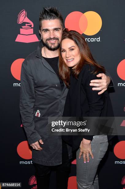 Juanes and Jessica Rodriguez, Executive Vice President and Chief Marketing Officer at Univision attend the Mastercard Meet and Greet during the 18th...