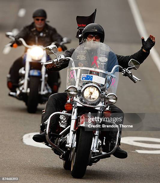 Motorbike enthusiast joins the convoy during his latest documentary 'By Any Means 2' at Freshwater Reserve on May 18, 2009 in Sydney, Australia....