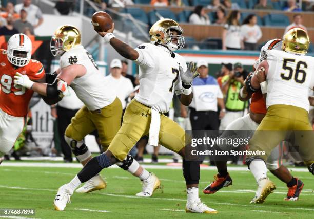 Notre Dame quarterback Brandon Wimbush passes during an NCAA football game between the Notre Dame Fighting Irish and the University of Miami...