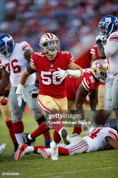 Brock Coyle of the San Francisco 49ers celebrates after making a defensive stop during the game against the New York Giants at Levi's Stadium on...