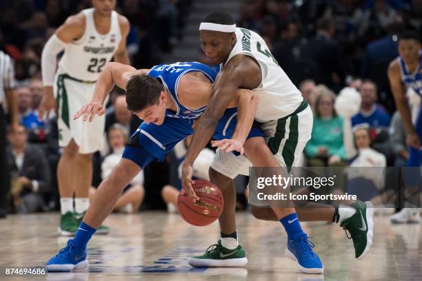 Michigan State Spartans guard Cassius Winston fouls Duke Blue Devils guard Grayson Allen going for a steal during the State Farm Champions Classic...