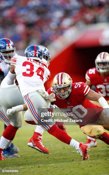 Brock Coyle of the San Francisco 49ers tackles Shane Vereen of the New York Giants during the game at Levi's Stadium on November 12, 2017 in Santa...