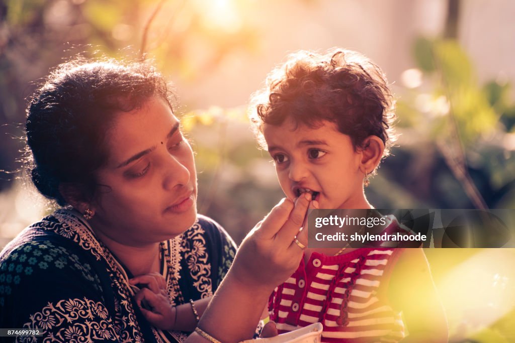 Mother feeding baby