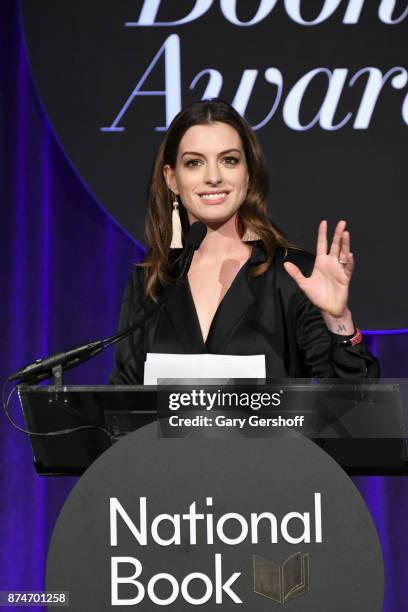 Anne Hathaway introduces event honoree Annie Proulx during the 68th National Book Awards at Cipriani Wall Street on November 15, 2017 in New York...