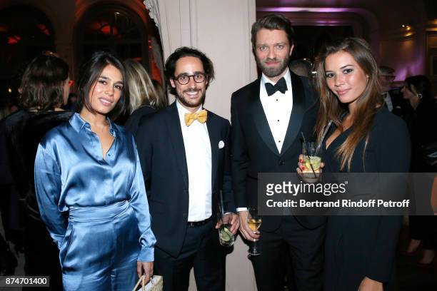 Thomas Hollande , his companion Emilie Broussouwoux , Emilie Tran Nguyen and Antoine Genton attend the GQ Men of the Year Awards 2017 at Le Trianon...