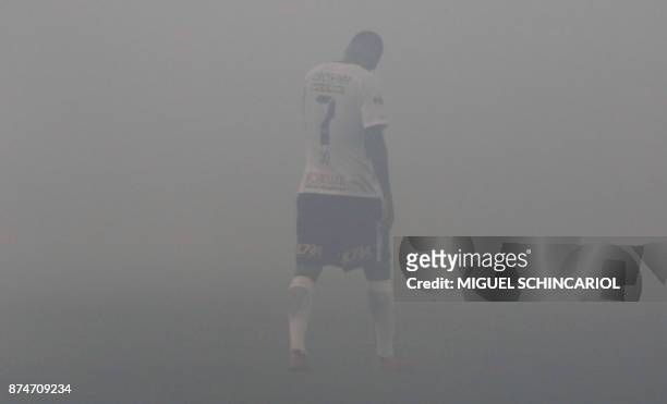 Jo of Brazil's Corinthians stands in fireworks smog during their 2017 Brazilian championship football match against Brazil's Fluminense at the Arena...