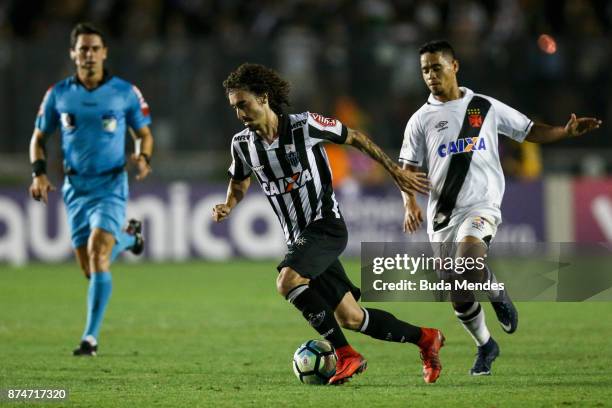 Valdivia of Atletico MG fights for the ball with Yago Pikachu of Vasco during a match between Vasco da Gama and Atletico MG as part of Brasileirao...
