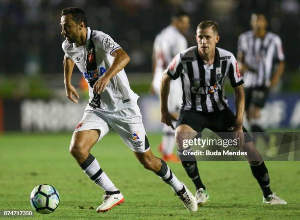 Adilson of Atletico MG fights for the ball with Nene of Vasco during a match between Vasco da Gama and Atletico MG as part of Brasileirao Series A...