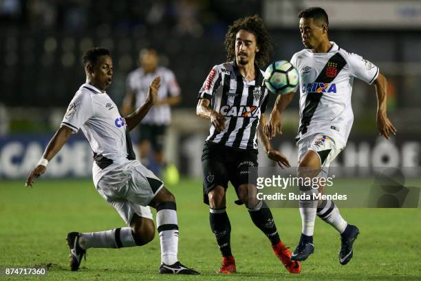 Valdivia of Atletico MG fights for the ball with Yago Pikachu and Wellington of Vasco during a match between Vasco da Gama and Atletico MG as part of...