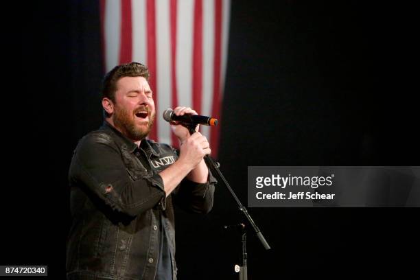 Chris Young performs onstage during CBS RADIO's Third Annual 'Stars and Strings' Concert to honor our nation's veterans at Chicago Theatre on...