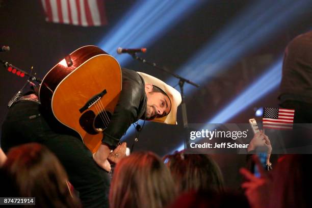 Brad Paisley performs onstage during CBS RADIO's Third Annual 'Stars and Strings' Concert to honor our nation's veterans at Chicago Theatre on...