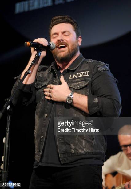 Chris Young performs onstage during CBS RADIO's Third Annual 'Stars and Strings' Concert to honor our nation's veterans at Chicago Theatre on...