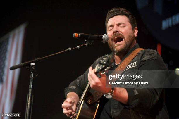 Chris Young performs onstage during CBS RADIO's Third Annual 'Stars and Strings' Concert to honor our nation's veterans at Chicago Theatre on...