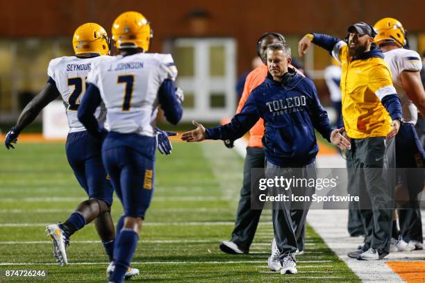 Toledo Rockets head coach Jason Candle congratulates his players after a score during first half game action between the Toledo Rockets and the...