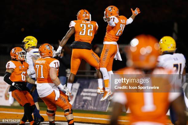 Bowling Green Falcons running back Andrew Clair and Bowling Green Falcons wide receiver Scott Miller celebrate a score in the end zone during first...