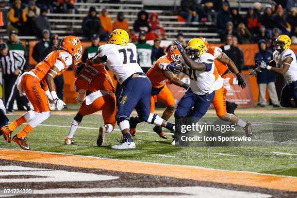 Toledo Rockets running back Shakif Seymour runs with the ball for a touchdown during first half game action between the Toledo Rockets and the...