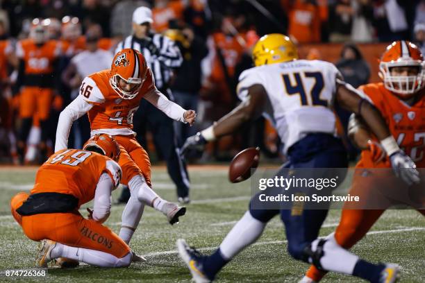 Bowling Green Falcons kicker Jake Suder kicks an extra point during first half game action between the Toledo Rockets and the Bowling Green Falcons...