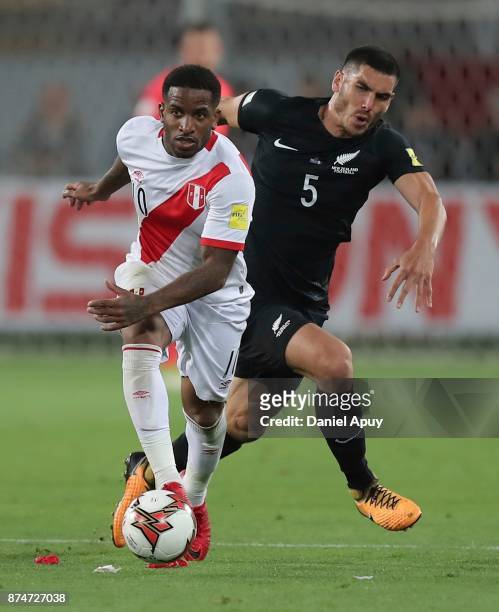 Jefferson Farfan of Peru fights for the ball with Michael Boxall during a second leg match between Peru and New Zealand as part of the 2018 FIFA...