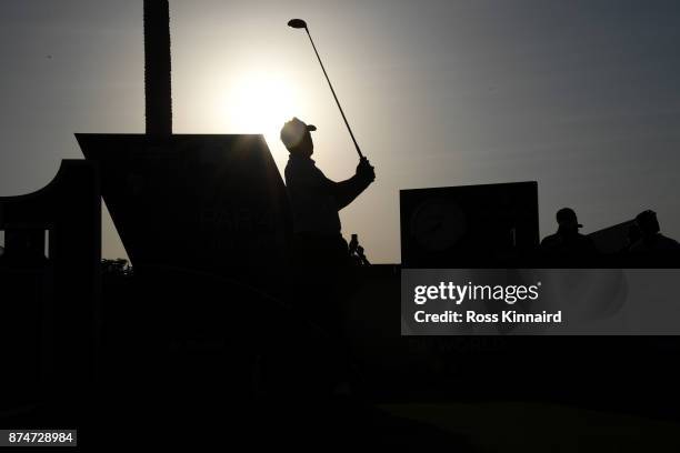 Ian Poulter of England hits the opening tee shot on the 1st hole during the first round of the DP World Tour Championship at Jumeirah Golf Estates on...