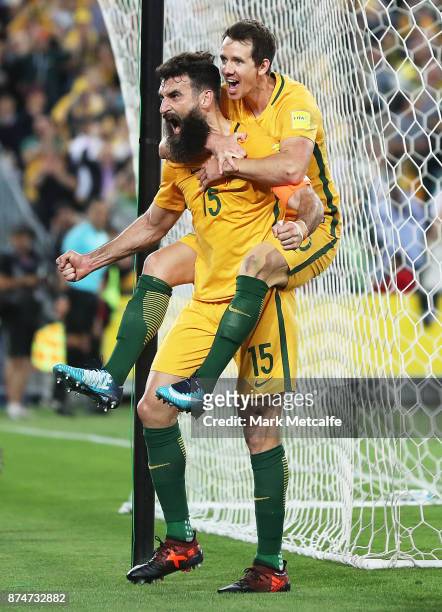 Mile Jedinak of Australia celebrates scoring a goal during the 2018 FIFA World Cup Qualifiers Leg 2 match between the Australian Socceroos and...