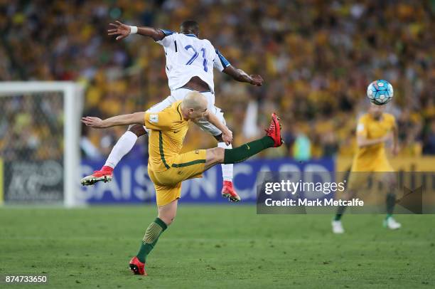 Aaron Mooy of Australia and Brayan Beckeles of Honduras compete during the 2018 FIFA World Cup Qualifiers Leg 2 match between the Australian...