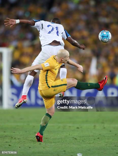 Aaron Mooy of Australia and Brayan Beckeles of Honduras compete during the 2018 FIFA World Cup Qualifiers Leg 2 match between the Australian...