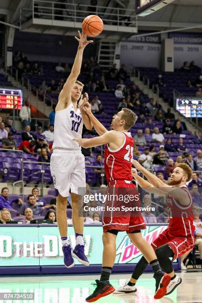 Horned Frogs forward Vladimir Brodziansky shoots over South Dakota Coyotes forward Tyler Hagedorn during the game between the South Dakota Coyotes...