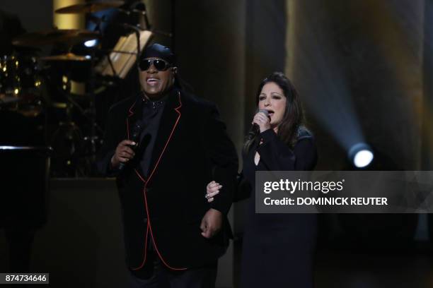 Singers Stevie Wonder and Gloria Estefan perform during the Library of Congress Gershwin Prize Honorees Tribute Concert in Washington, DC on November...