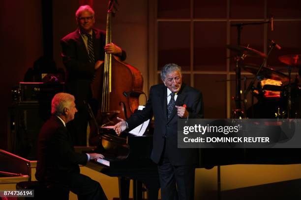 Singer Tony Bennett performs during the Library of Congress Gershwin Prize Tribute Concert in his honor in Washington, DC on November 15, 2017. / AFP...