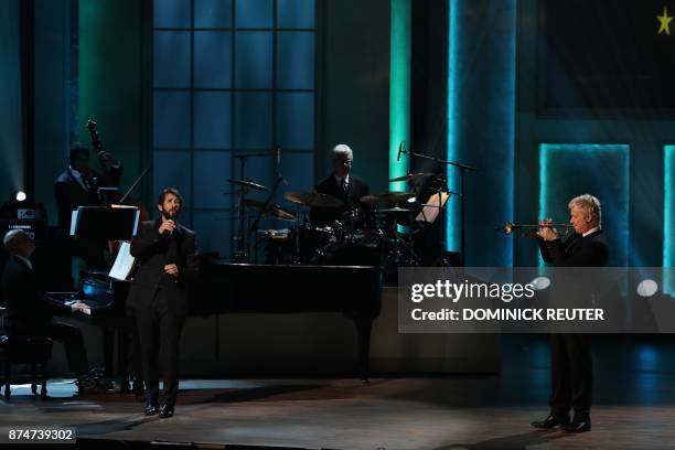 Singer Josh Groban performs with trumpeter Chris Botti during the Library of Congress Gershwin Prize Honorees Tribute Concert in Washington, DC on...