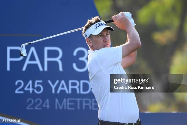 Ian Poulter of England tees off on the 4th hole during the first round of the DP World Tour Championship at Jumeirah Golf Estates on November 16,...