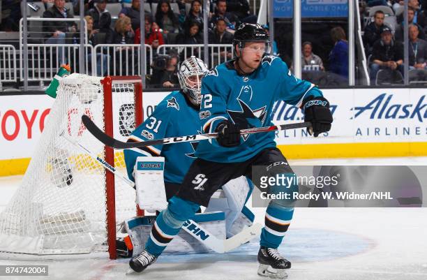 Martin Jones and Tim Heed of the San Jose Sharks defend against the Tampa Bay Lightning at SAP Center on November 8, 2017 in San Jose, California.