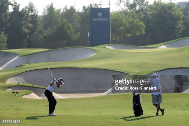 Ian Poulter of England hits his second shot on the 5th hole during the first round of the DP World Tour Championship at Jumeirah Golf Estates on...