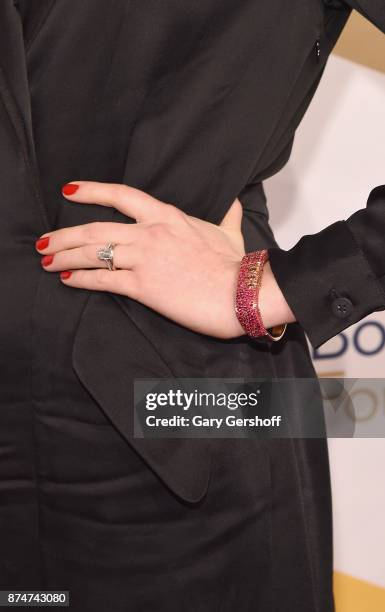 Anne Hathaway, ring & jewelry detail, attends the 68th National Book Awards at Cipriani Wall Street on November 15, 2017 in New York City.