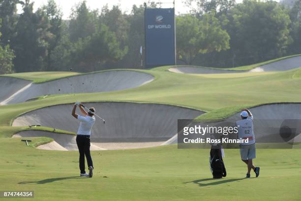 Ian Poulter of England hits his second shot on the 5th hole during the first round of the DP World Tour Championship at Jumeirah Golf Estates on...
