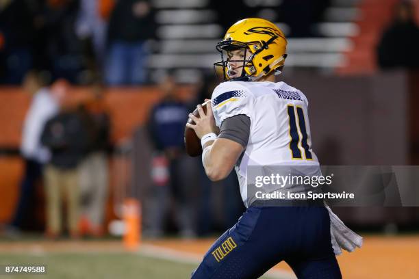 Toledo Rockets quarterback Logan Woodside looks for an open receiver during second half game action between the Toledo Rockets and the Bowling Green...